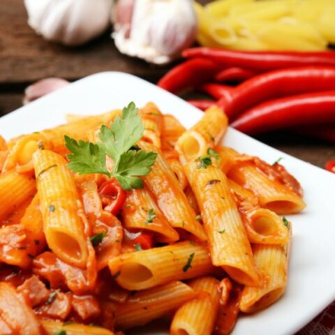 pasta alla peperonata on a white plate