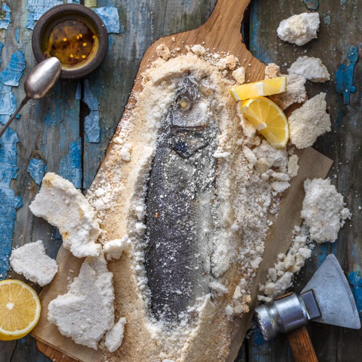 Pescado a la sal on a cutting board
