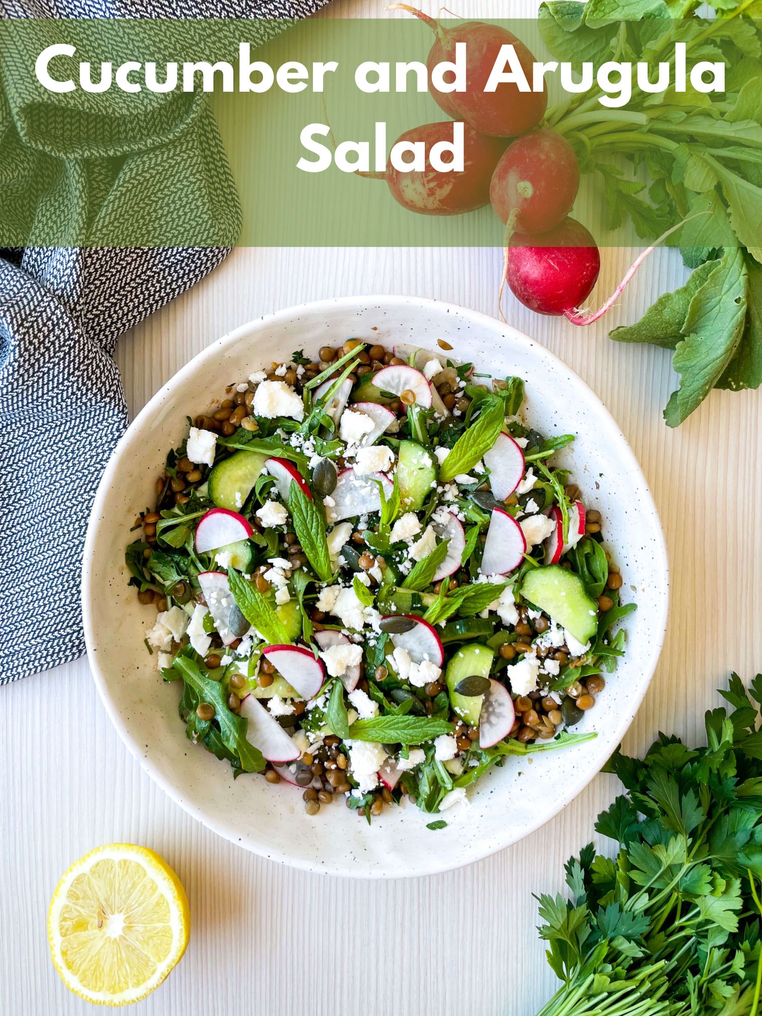 cucumber and arugula salad with feta in a bowl on a table